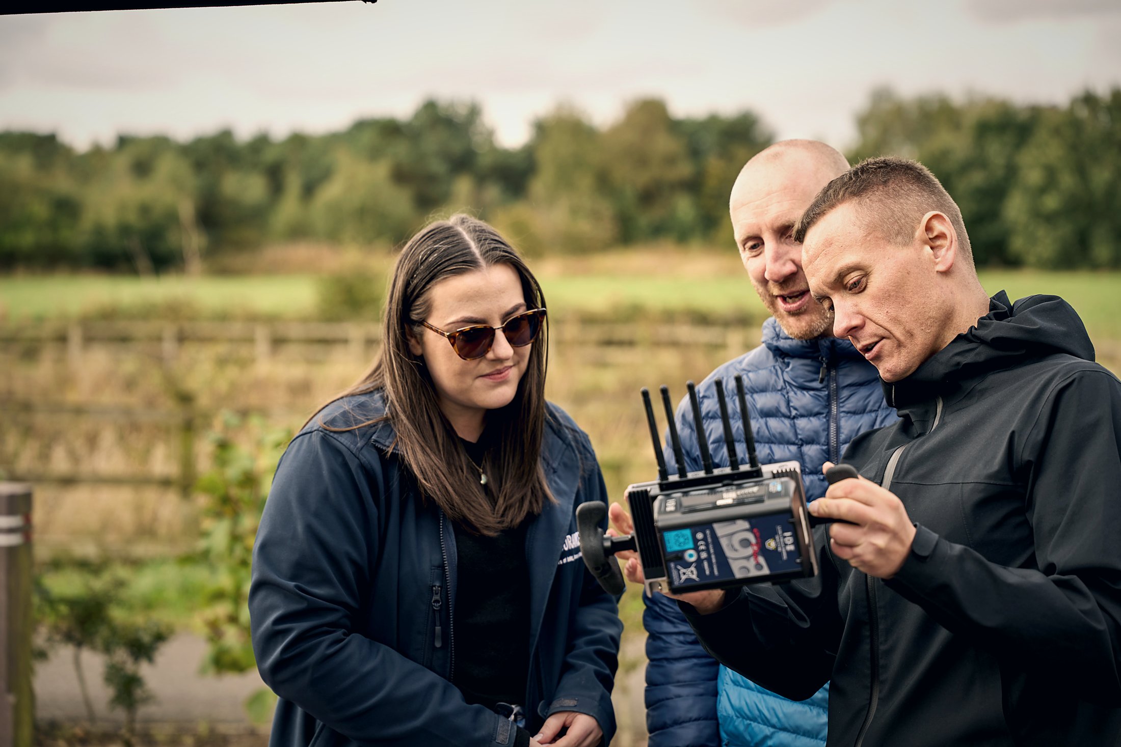 ottowilf crew on set, reviewing footage