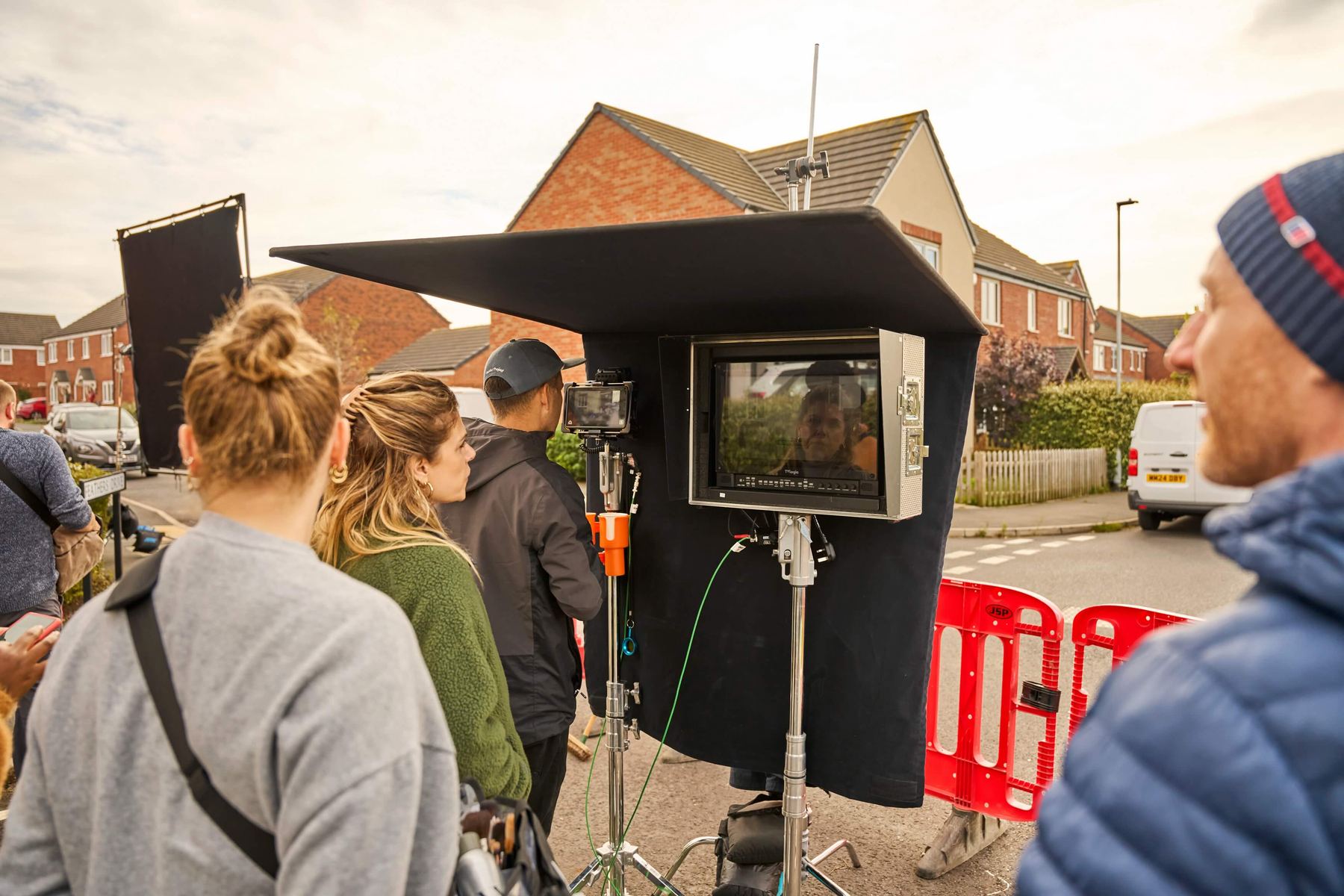 Crew reviewing a shot on the video village monitor