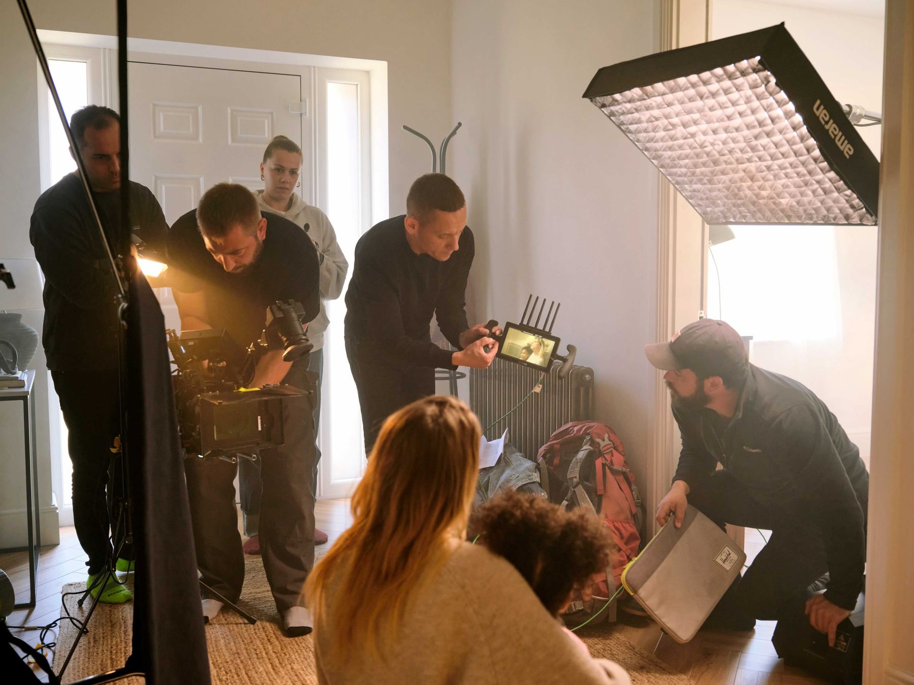 Crew setting up a shot indoors